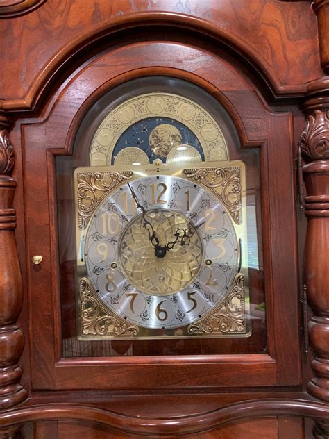 A tall clock in a wooden case that stands on the floor 2. Determining the Value of a Grandfather Clock? | ThriftyFun