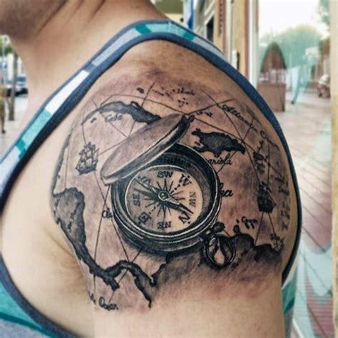 Picture Of Upper Shoulder World Map Tattoo With A Compass