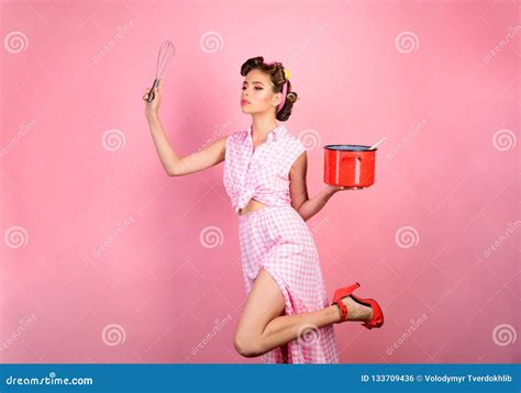 retro woman cooking in kitchen pinup girl with fashion hair perfect housewife pin up woman