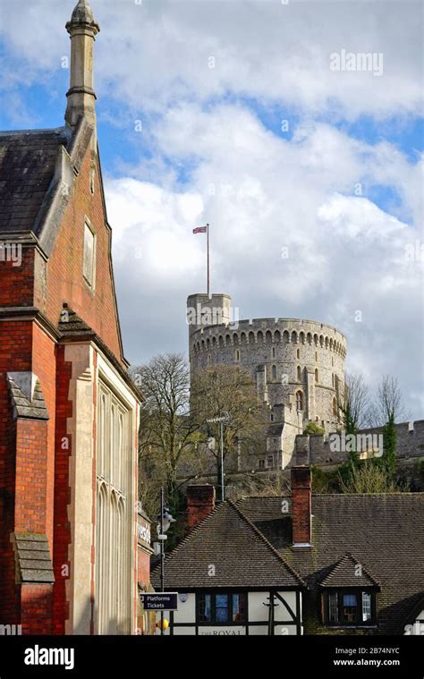 The Round Tower At Windsor Castle With The Facade Of Windsor And Eton