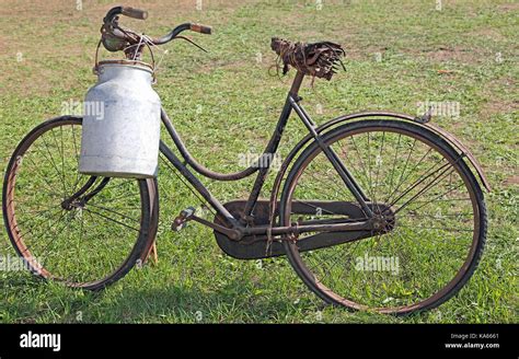 Very Old Milking Bicycle With Aluminum Milk Canister To Deliver Milk Just Moistened Stock Photo