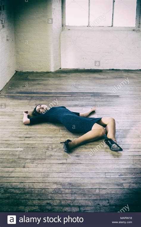 Download This Stock Image Dead Woman Laying Down On The Floor Marw18