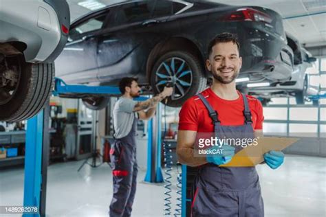 Mechanic Electric Car Photos And Premium High Res Pictures Getty Images