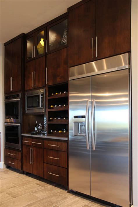 The dark, warm, luxurious look means these kitchen cabinets don't need any staining. Slab veneer cabinet doors in select walnut by TaylorCraft Cabinet Door Company - Modern ...