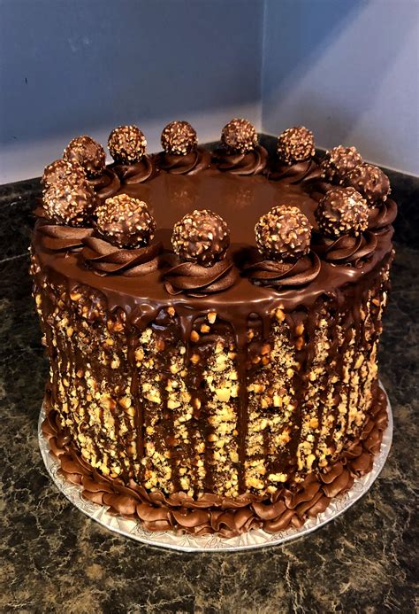 This classic recipe is filled with simple syrup, ganache, nutella and real roasted hazelnuts. homemade Ferrero Rocher Cake via /r/food - Healthy ...