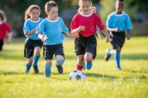 Best Kids Playing Soccer Stock Photos Pictures And Royalty Free Images