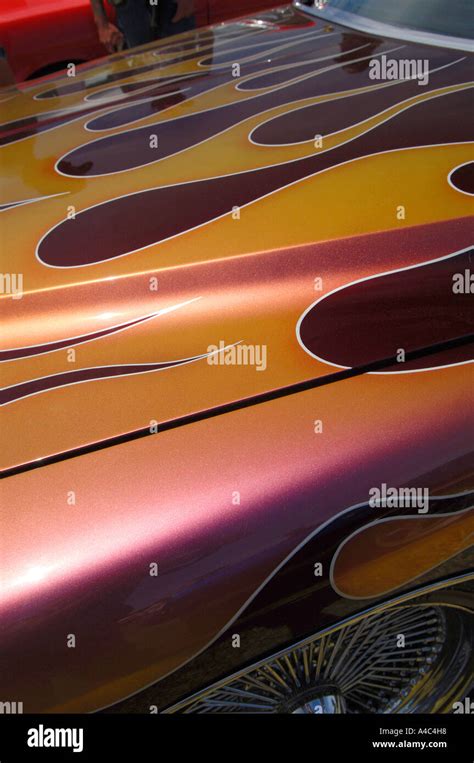 Metallic Maroon And Gold Paintwork On Classic Car Stock Photo Alamy
