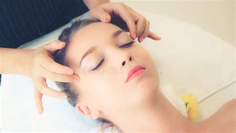 Woman Gets Facial And Head Massage In Luxury Spa Stock Image Image Of Aromatherapy Health