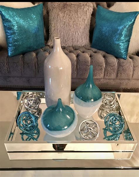 You don't have to wait for santa (or the post office) to drop off your gifts and decor with our convenient pickup options. Teal accents on coffee table | Teal living room decor ...