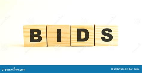 The Word Bids Consists Of Wooden Cubes With Letters Top View On A