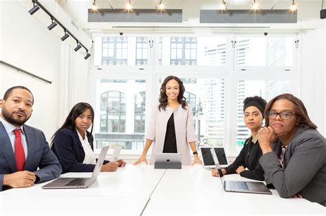 Group Of Coworkers On A Board Room · Free Stock Photo