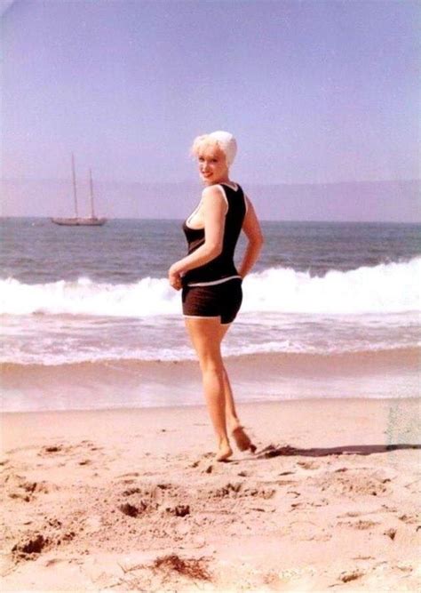 Candid Photographs Of Marilyn Monroe In Black Swimsuit From The