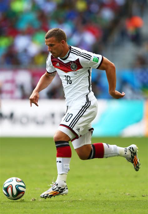Volta football meets weltmeister meets streetart. Lukas Podolski - Germany v Portugal: Group G - 2014 FIFA ...