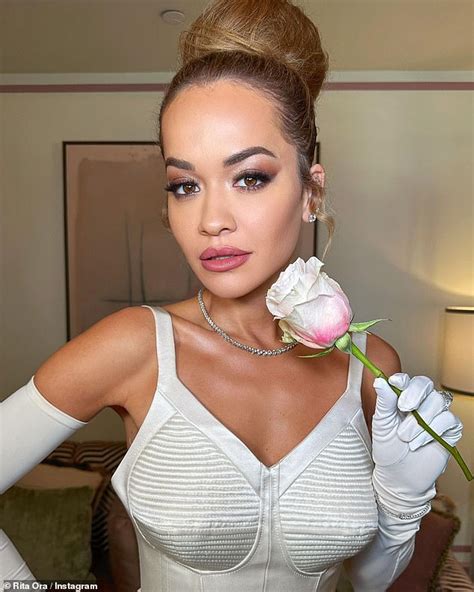 Rita Ora Poses Like A Storm As She Shares Glamorous Behind The Scenes