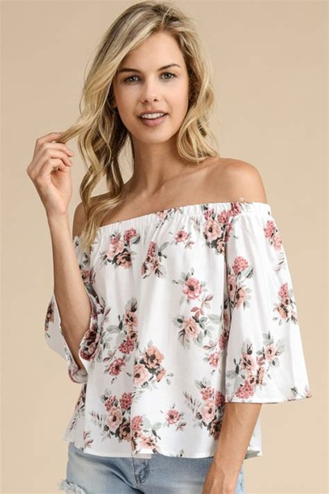 we are obsessed with our newest off shoulder blouse in a gorgeous floral pattern and off