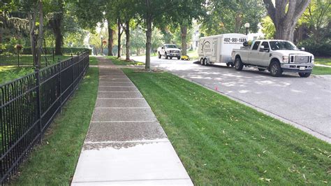 Changing lawn mowing practices promotes a healthy lawn and reduces the amount of material at your curb for collection. Granular Compost Top Dressing by Omaha Organics Lawn Care