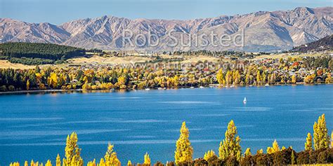 Lake Wanaka And Wanaka Township Looking Across Roys Bay With Sailing