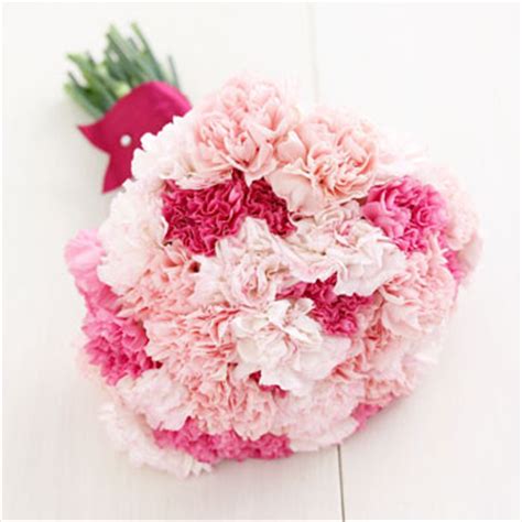 Chrysanthemums, roses, ranunculus, delphinium, marigolds The Carnation Wedding Bouquet: Pretty & Perfect for a ...