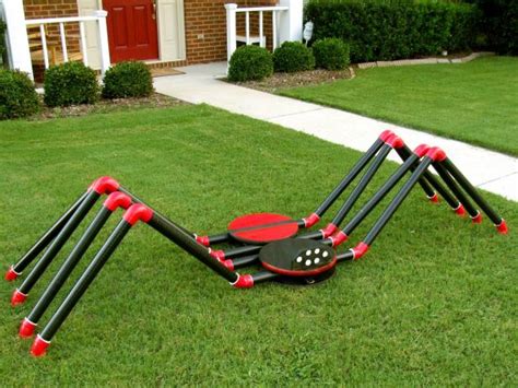 Black hairy spider with red eyes made of wool and wire bendable legs place at different spots on halloween to scare people description: Halloween Decoration: How to Build a Giant Spider | how ...