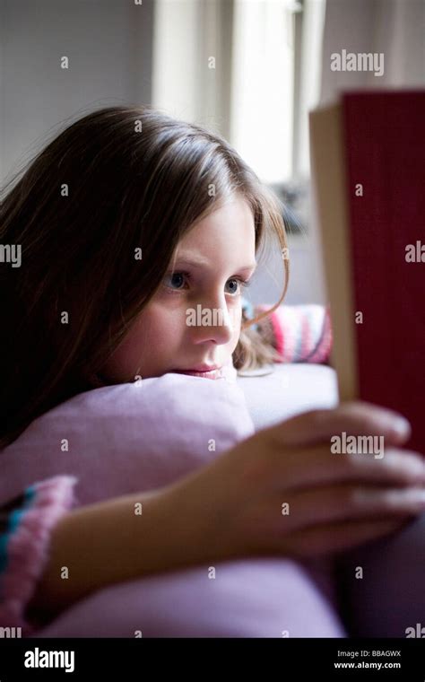 Girl Reading Book Stock Photo Alamy
