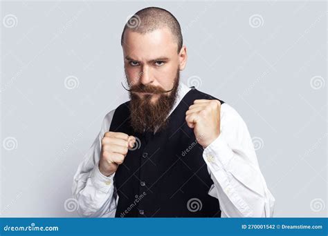 Serious Angry Man With Clenched Fists Being Ready To Fight With