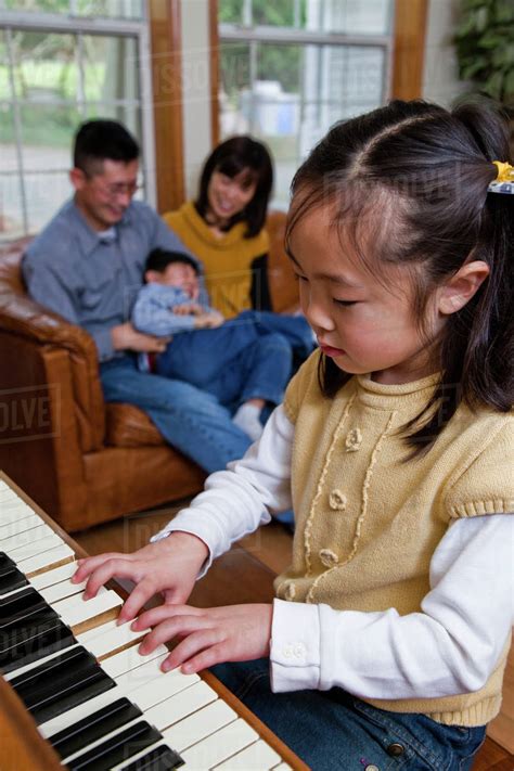 Korean Girl Playing Piano Stock Photo Dissolve