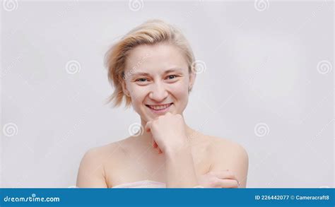 Attractive Topless Model Smiling At The Camera Hand On Her Chin