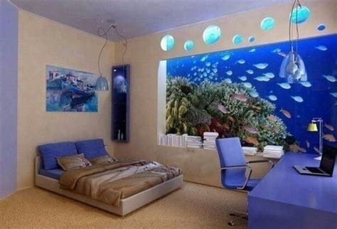 A Room With A Bed Desk And Aquarium On The Wall In It S Center