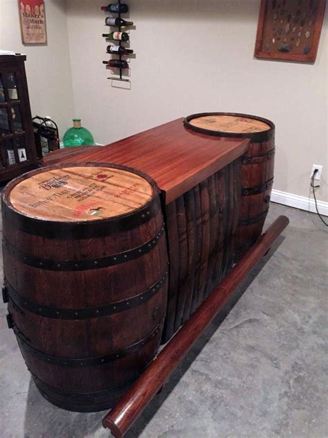 One of the brown bar stools in this kitchen has white parts which mix with the dominant color scheme of the kitchen. Brilliant do it yourself basement bar ideas to inspire you #fixupbasement in 2020 | Wine barrel ...