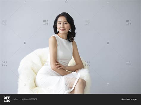 A Beautiful Mature Chinese Woman Stock Photo Offset