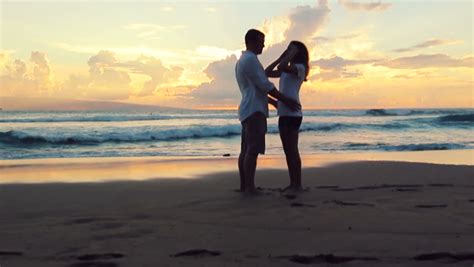 Honeymoon Passionate Couple Holding Hands Walking Into Sunset Romantic