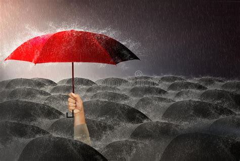 Red Umbrella Against The Stormsky Background And Black Cloud Group And