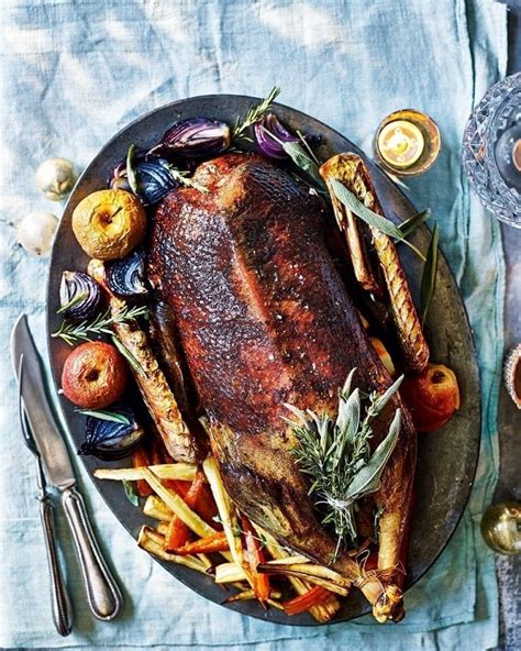Stuffed pork loin with roasted root vegetables. 55 Make-ahead Christmas dinner recipes | delicious. magazine