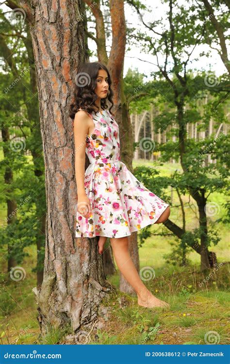 Teenage Girl Leaning On Trunk Of Tree Stock Photo Image Of Summer