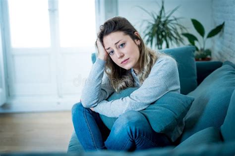 Young Sad Woman Suffering From Depression Feeling Desperate And Lonely
