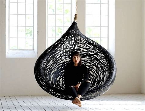 It features white and natural rattan details for a fresh, beachy look. This unique hanging chair design is made from black ...