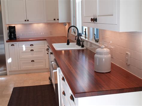 D cultured marble vanity top in white with white sink. Sink Cutouts in Custom Wood Countertops