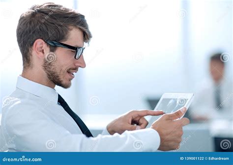 Businessman Using His Tablet In The Office Stock Photo Image Of