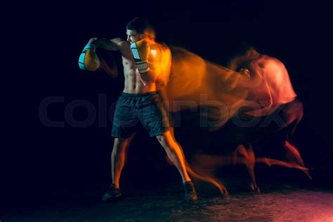 Male Boxer Boxing In A Dark Studio Stock Image Colourbox