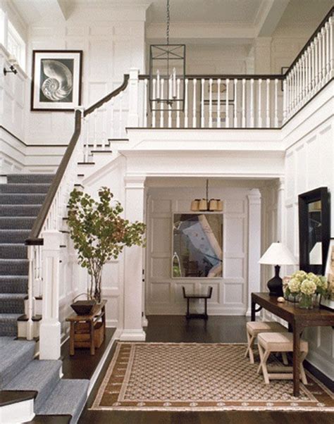 This Large Front Hall With Open Stairs Beautiful Woodwork