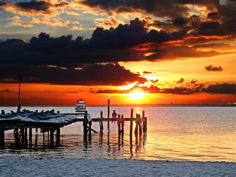 Sitting On The Dock Photograph By Larry Roby