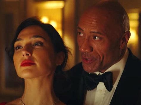 Watch Gal Gadot Take Off Her Heels Before Beating Up Dwayne Johnson And