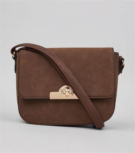 Brown Twist Lock Saddle Bag New Look Bags Brown Handbag Faux