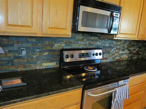 Well Liked Oak Cabinetry Set Also Stacked Stone Backsplash As Well As
