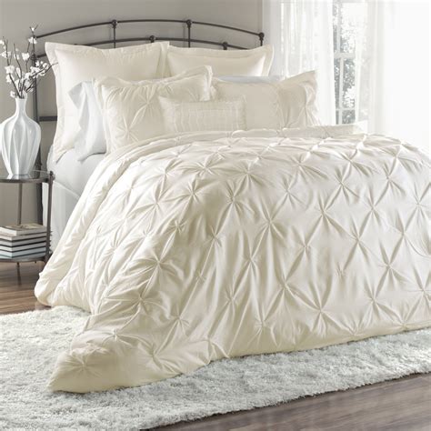 One comforter, one bed skirt, two pillow shams 250 gsm comforter Lush Decor Lux 6 Piece Comforter Set & Reviews | Wayfair