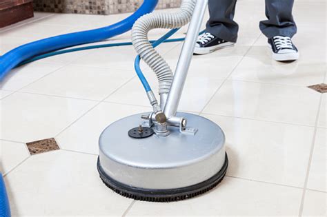 Clean the tiles for most types of tile, including porcelain and ceramic, a diy grout cleaner of warm water and dish soap will do the trick. Tile And Grout Cleaning Stock Photo - Download Image Now ...