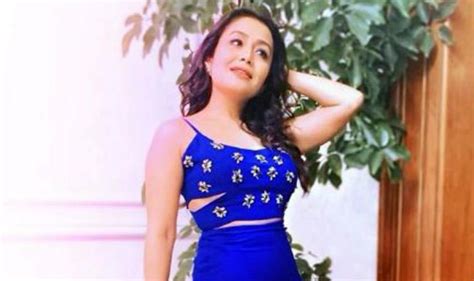 Singing Sensation Neha Kakkar Looks Smoking Hot In Blue Crop Top And Thigh High Slit Skirt In