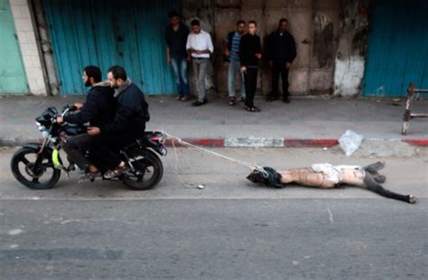 Hamas Victim Dragged Through The Streets Of Gaza City Tuesday By