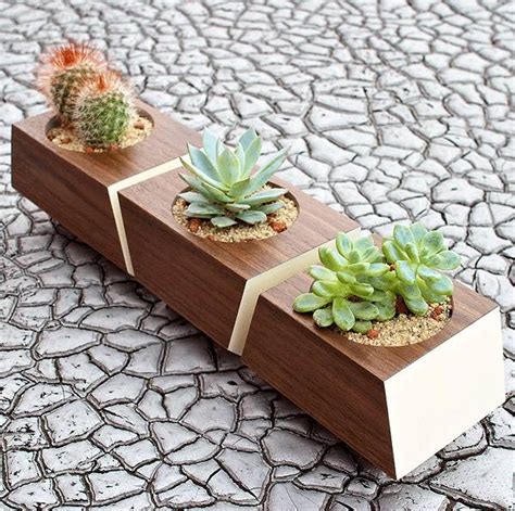 Two piece succulent planter with a small reservoir in the bottom to avoid water drainage onto the table the plant sits on. 10 Modern Planters That Welcome The Spring In Style