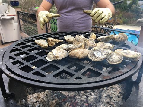 No, you should season the rusty grill first, by scraping off as much rust from the rack as possible, brush oil on the rack, or spray generously with cooking spray, then let sit in flames for a while. Wood Fired Oysters + Roasted Seafood Cooked on OFYR Grill